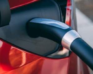 What role do fuel station forecourts play in a society of EV drivers?